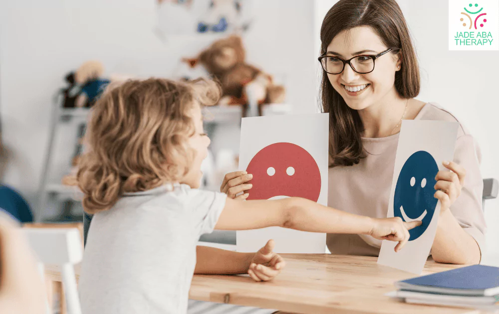 Lady showing smiling pictures to a girl