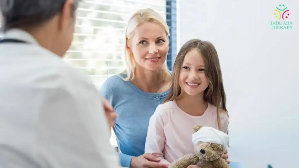 mother-and-daughter-visiting-pediatrician-in-clinic