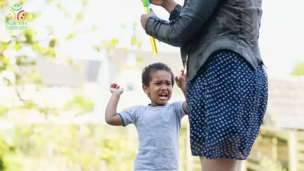 upset-young-child-outdoors-during-parent-interaction
