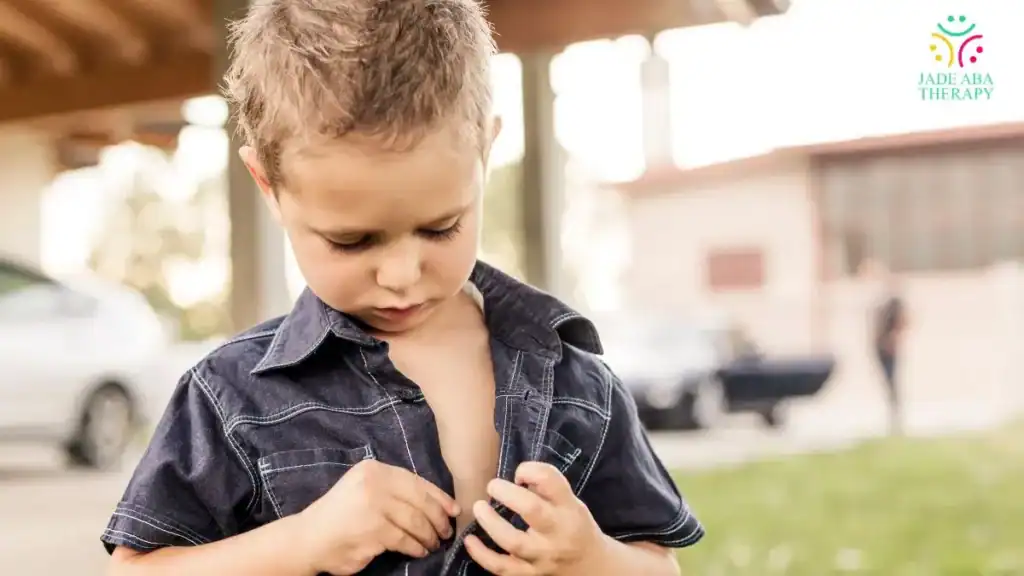 child-buttoning-shirt-during-daily-living-skills-practice